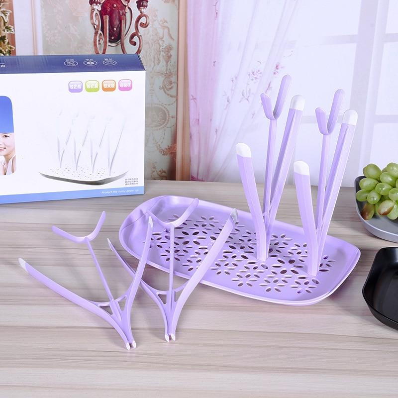 https://grandmasgiftshop.com/wp-content/uploads/2021/08/Baby-Bottle-Drying-Rack-4-Colors-Baby-Feeding-Bottles-Cleaning-Drying-Rack-Storage-Nipple-Shelf-Baby_b0f5e9c0-ad59-4542-9465-43146ea4272f.jpg