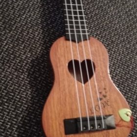 Mini Ukulele Kids Musical Toy photo review